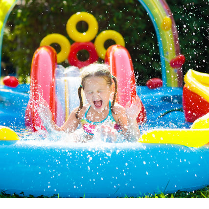 Party & Event RentalsGirl sliding down an inflatable water slide